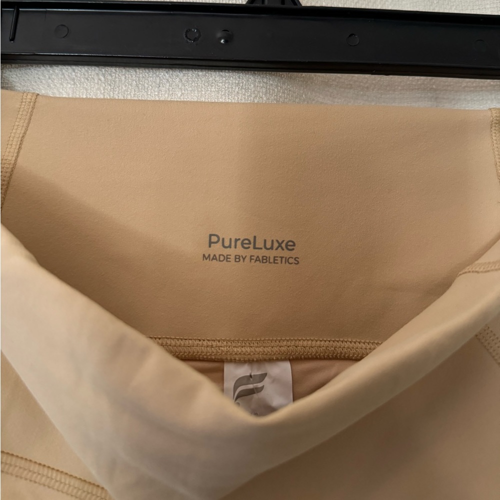 Never worn. Brand new with tags. Fabletics pure luxe
